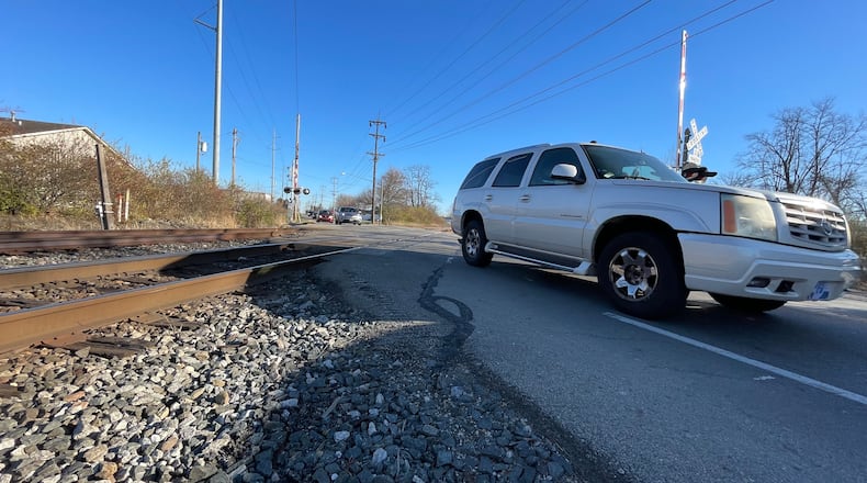 Fairfield is seeking the public's input on the Symmes Road Railroad Crossing Elimination Project, which would construct an overpass on Symmes Road. The project would resemble the South Hamilton Crossing project in Hamilton constructed in 2018. Pictured is a 2022 file photo of the Symmes Road railroad crossing. MICHAEL D. PITMAN/STAFF
