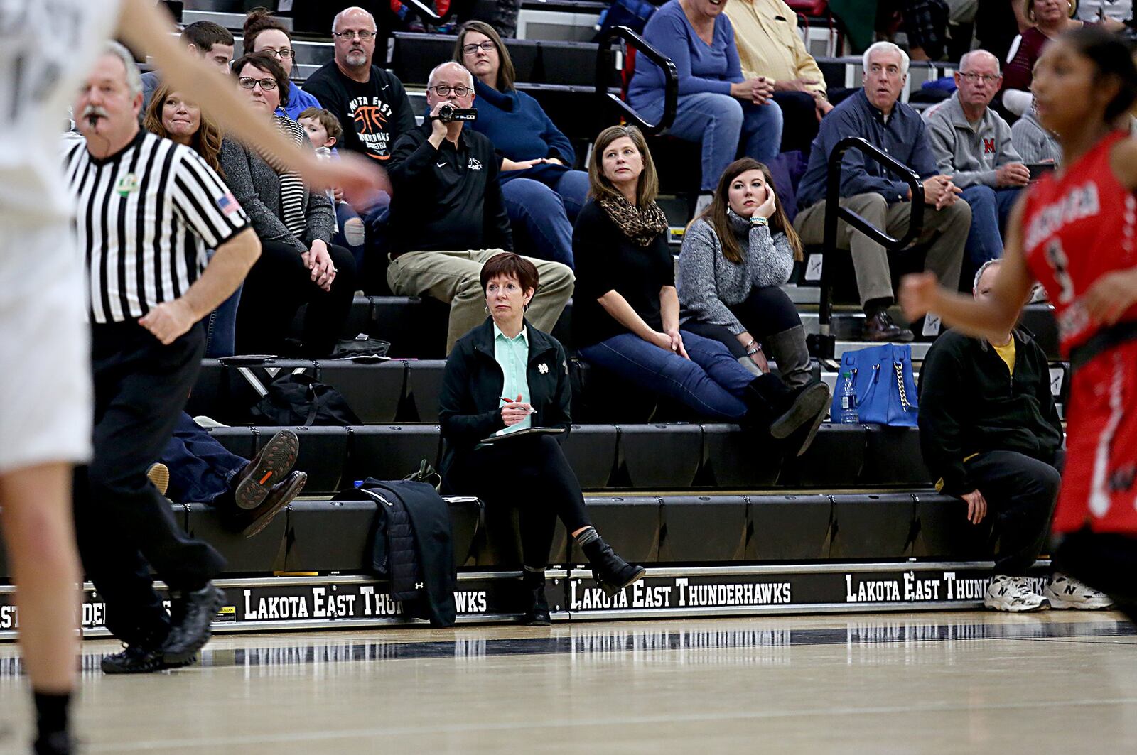 University of Notre Dame women’s basketball coach Muffet McGraw watches Wednesday night’s Lakota West-Lakota East game at East. CONTRIBUTED PHOTO BY E.L. HUBBARD