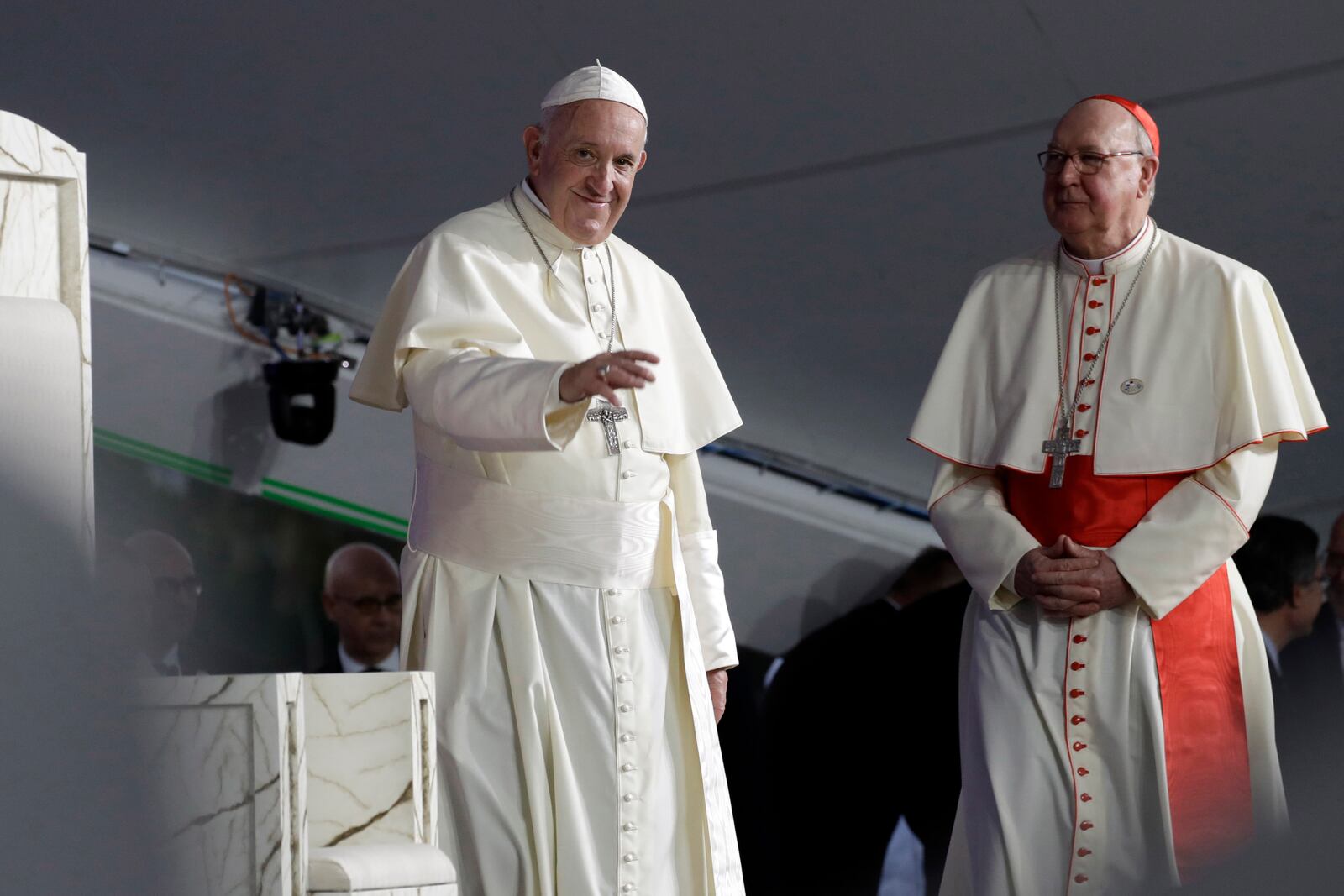 FILE - Pope Francis, left, is flanked by Cardinal Kevin Farrell during a vigil at Campo San Juan Pablo II in Panama City, Jan. 26, 2019. (AP Photo/Alessandra Tarantino, File )