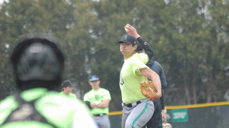 Badin junior Matty Helms sends a practice pitch to the plate during a scrimmage against Hamilton on Wednesday night at Alumni Field. Chris Vogt/CONTRIBUTED