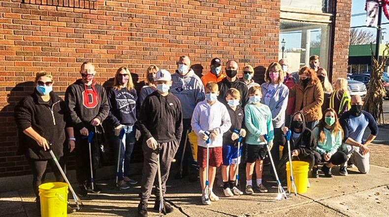 About 12 Linden Elementary School staff and nine family members, led by Linden's Physical Education teacher Jimi sizemore, recently gave back to their community by volunteered their time to help the Lindenwald Litter Patrol clean up the streets and alleys around the Lindenwald area. CONTRIBUTED