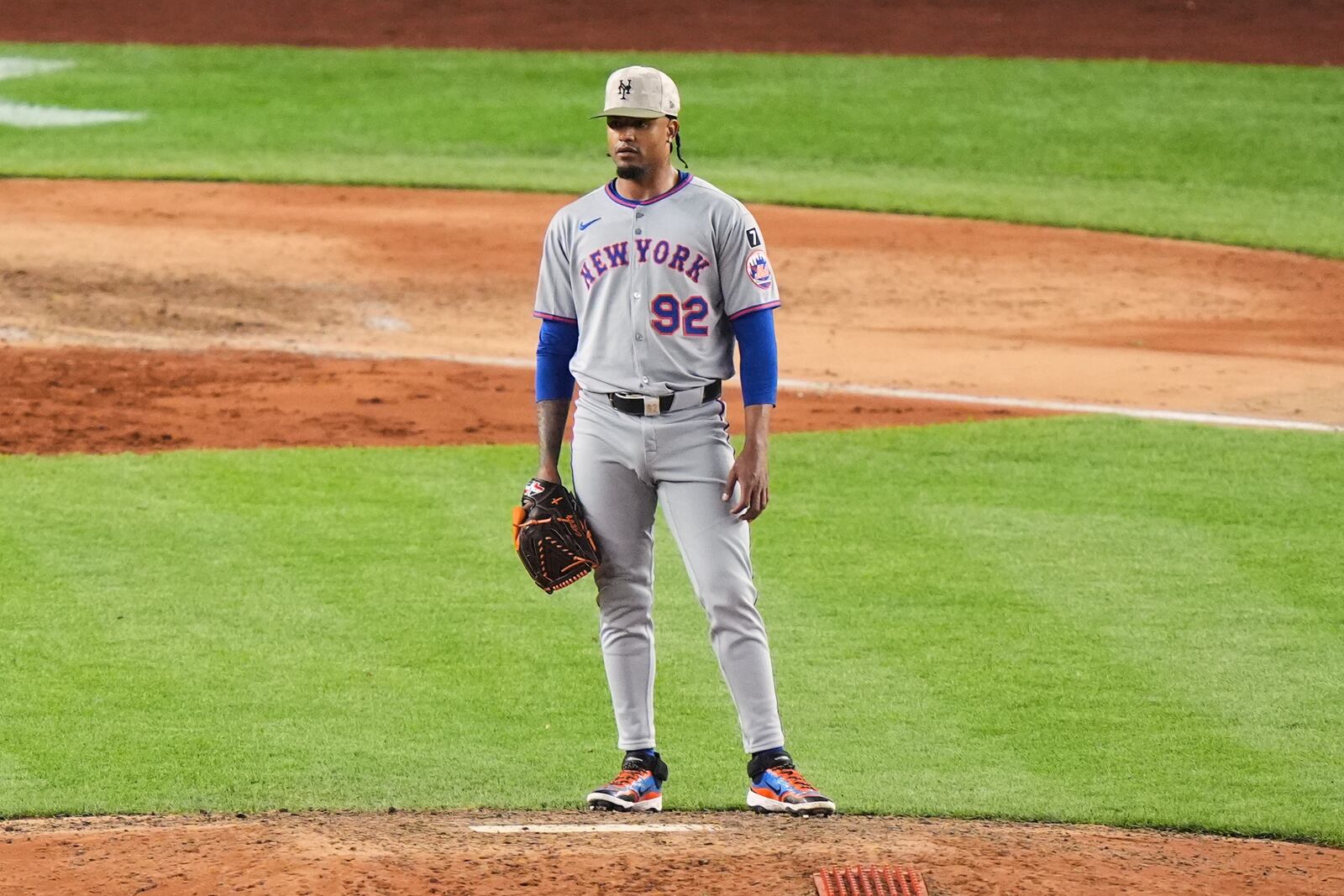 New York Mets pitcher Génesis Cabrera (92) reacts after New York Yankees' Cody Bellinger hit a grand slam during the eighth inning of a baseball game Sunday, May 18, 2025, in New York. (AP Photo/Frank Franklin II)