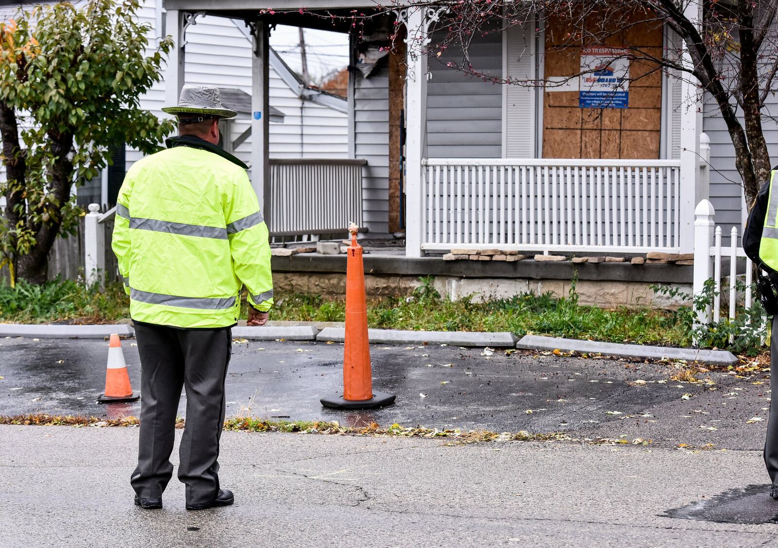 Butler County Sheriff’s deputies accompanied the jury to the Pater Avenue home in Hamilton before the start of the trial of Lester Park and William Tucker on Tuesday, Nov. 7. Parker and Tucker are charged with murder and arson in the December 2015 fire that killed Hamilton firefighter Patrick Wolterman. NICK GRAHAM/STAFF