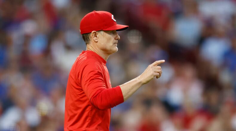 Cincinnati Reds manager David Bell walks to the mound during the seventh inning of the team's baseball game against the Chicago Cubs in Cincinnati, Thursday, June 6, 2024.. (AP Photo/Paul Vernon)