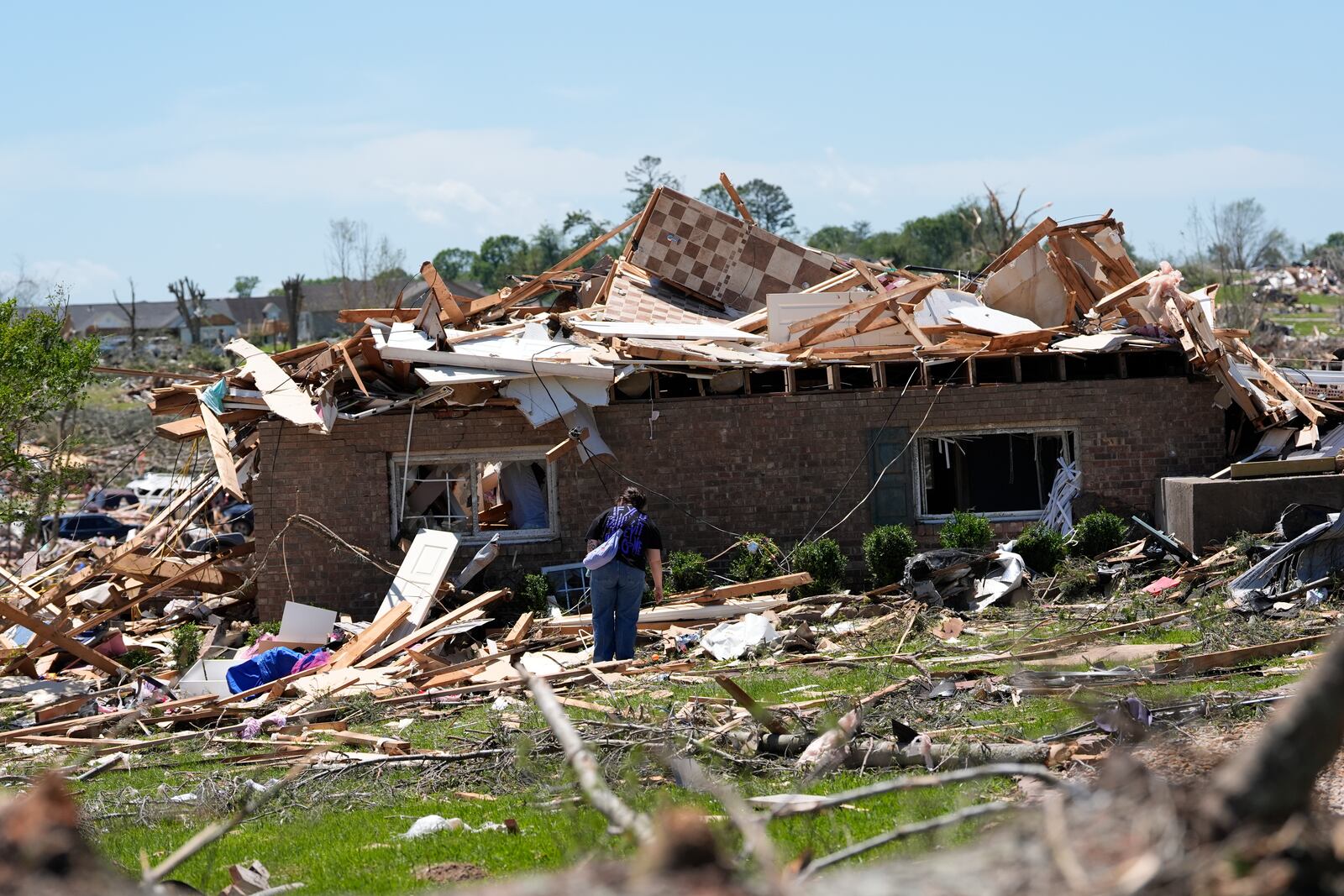 A home is destroyed after a severe storm passed the area on Saturday, May 17, 2025 in London, Ky. (AP Photo/Carolyn Kaster)