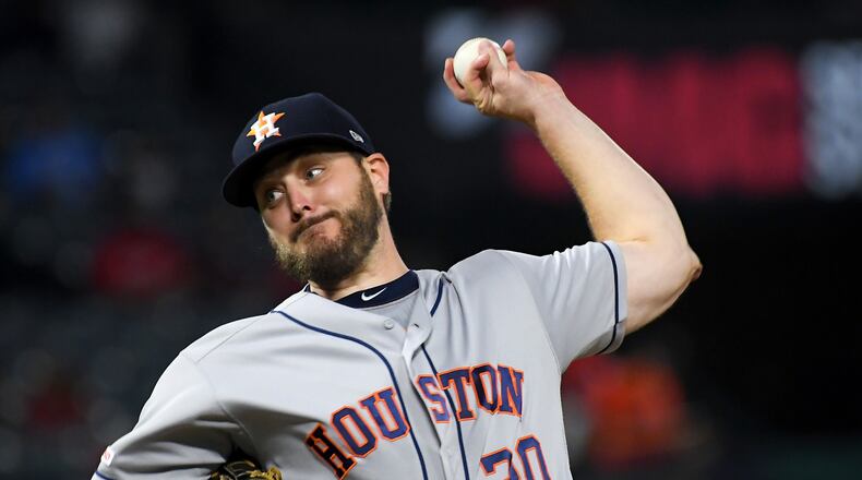 ANAHEIM, CA - SEPTEMBER 26: Wade Miley #20 of the Houston Astros pitches in the second inning of the game against the Los Angeles Angels at Angel Stadium on September 26, 2019 in Anaheim, California. (Photo by Jayne Kamin-Oncea/Getty Images)