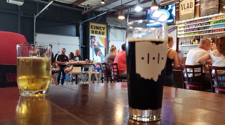 Blue Ash-based Fretboard Brewing and Cincinnati-based Looking Glass Hospitality Group are partnering to reintroduce rooftop dining and drinking in downtown Hamilton. Eatery and microbrewery Fretboard Brewing & Public House will open next month at 103 Main St., the former location of Quarter Barrel Brewery + Pub. ERIC SCHWARTZBERG/STAFF