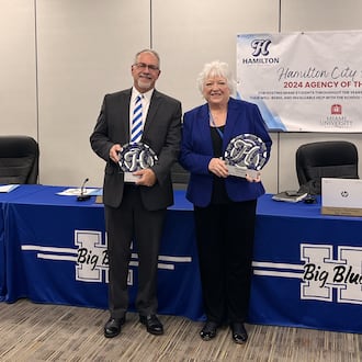 In the history of Hamilton’s city schools, few members of its governing school board have presided over more tumultuous times than soon-to-retire Laurin Sprague. The former teacher, principal and fine arts director for all of Hamilton schools and later a two-term Hamilton Board of Education member will see his time on the board end on Jan. 1, after he chose not to seek re-election this fall. He and fellow board member Margaret "Mag" Baker, who is also retiring from the board, were honored with awards earlier this month for the service to the city schools. (Provided)