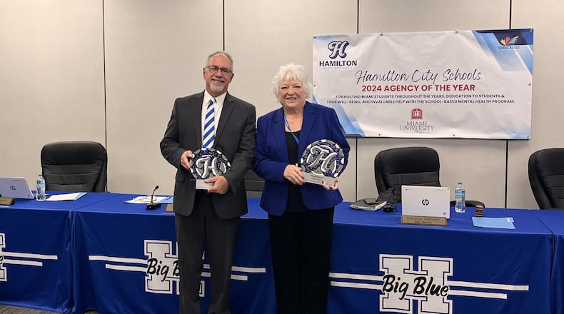 In the history of Hamilton’s city schools, few members of its governing school board have presided over more tumultuous times than soon-to-retire Laurin Sprague. The former teacher, principal and fine arts director for all of Hamilton schools and later a two-term Hamilton Board of Education member will see his time on the board end on Jan. 1, after he chose not to seek re-election this fall. He and fellow board member Margaret "Mag" Baker, who is also retiring from the board, were honored with awards earlier this month for the service to the city schools. (Provided)