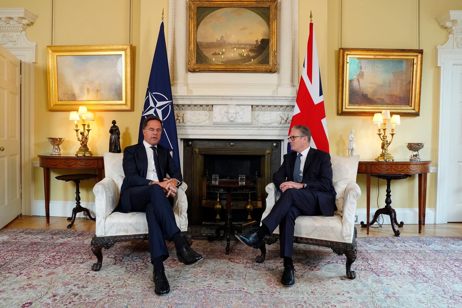 Britain's Prime Minister Sir Keir Starmer, right, and Nato Secretary General Mark Rutte talk during their meeting at 10 Downing Street in London, Monday, June 9, 2025. (Jordan Pettitt/PA via AP)