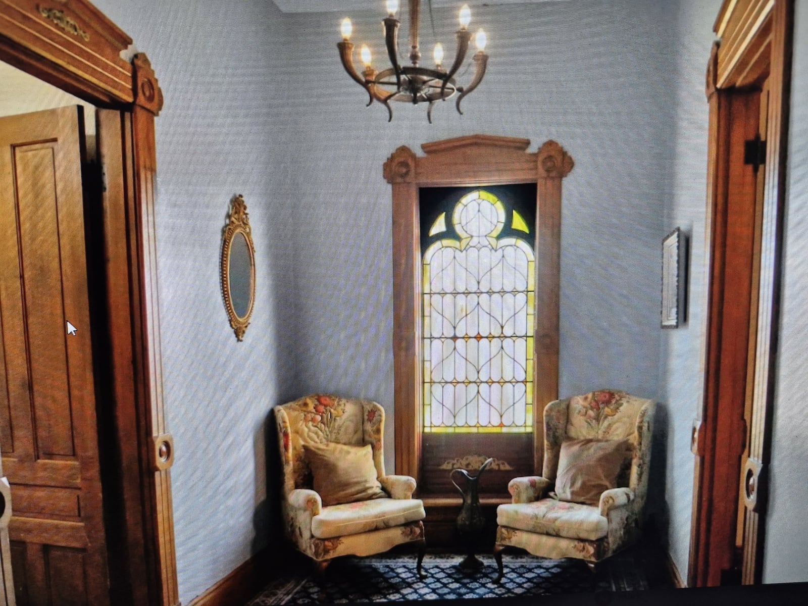 Original woodwork and lighting fixtures, and stained glass can be found throughout the home, which was built in 1876. PROVIDED
