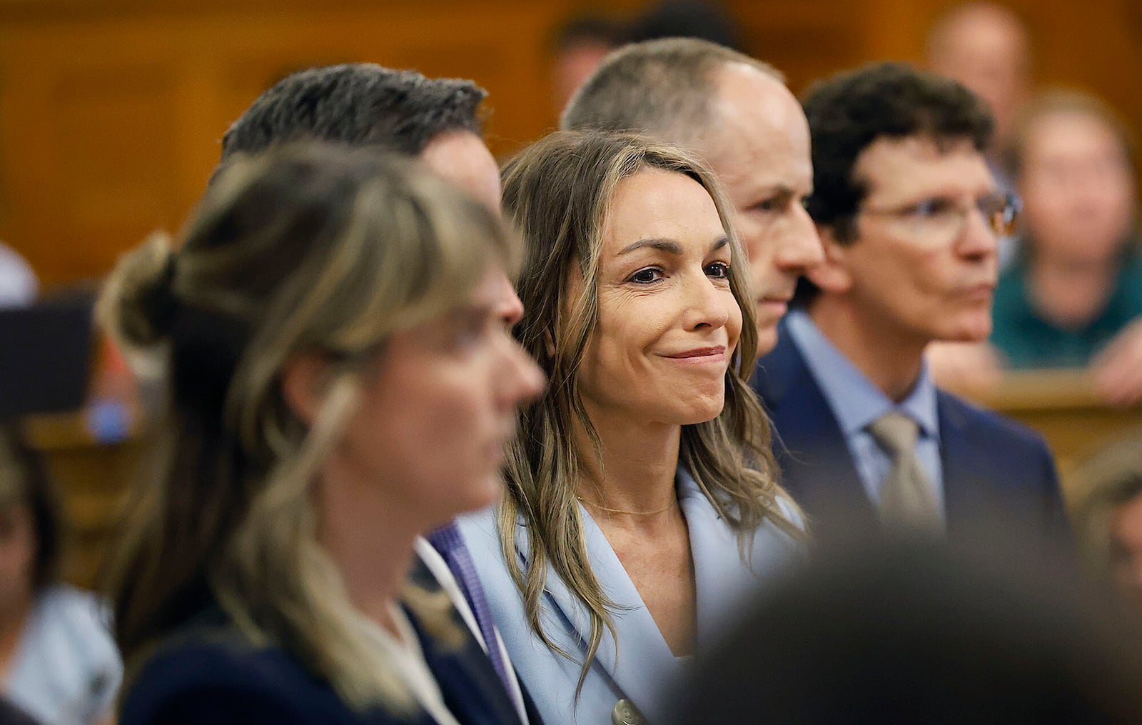 Karen Read smiles as the not guilty verdict of second-degree murder is read in Norfolk Superior Court, Wednesday, June 18, 2025, in Dedham, Mass. (Greg Derr/The Patriot Ledger via AP, Pool)