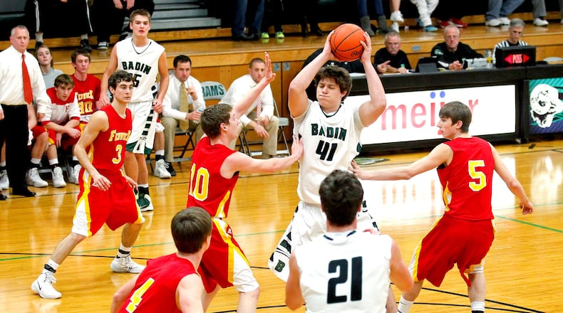Badin’s Dominic Valentino (41) fends off Fenwick defenders Kevin Christie (10) and Dan Roach (5) during a game at Badin’s Mulcahey Gym on Jan. 28, 2014. JOURNAL-NEWS FILE PHOTO