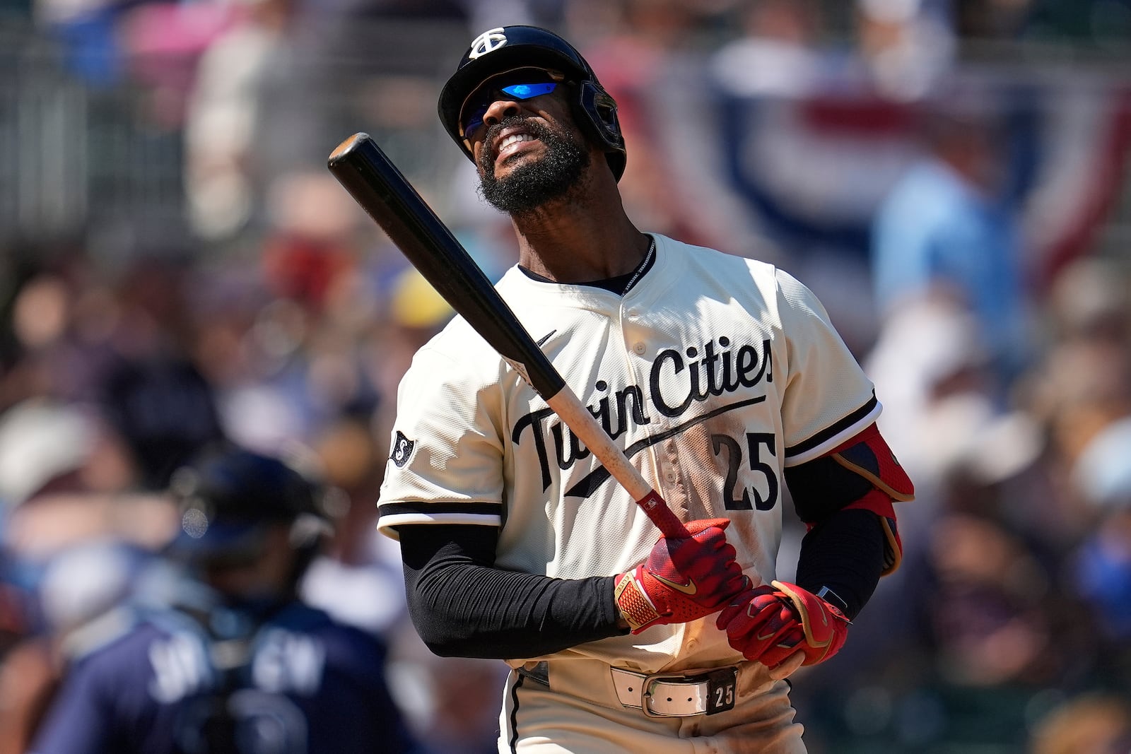 Minnesota Twins' Byron Buxton reacts after hitting a foul out to end the bottom of the ninth inning of a baseball game against the Tampa Bay Rays, Sunday, July 6, 2025, in Minneapolis. (AP Photo/Abbie Parr)