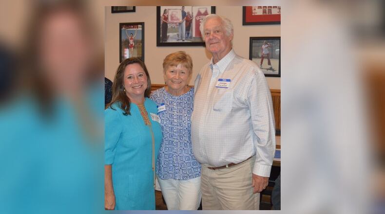 Shelly Simonds (left) with her parents, Mickey and George Simonds, of Oxford, after she spoke about her Virginia election ordeal in which her opponent’s name was drawn from a bowl after a tie and he was declared the winner. CONTRIBUTED/BOB RATTERMAN