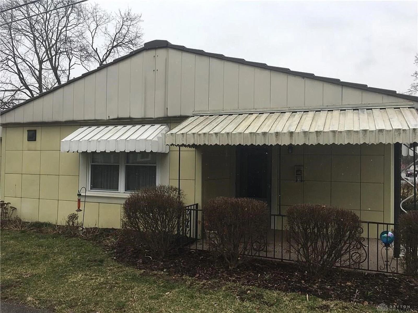 The steel house at 219 S. Cherry St. in Germantown is for sale. The  Lustron home  is maize yellow.