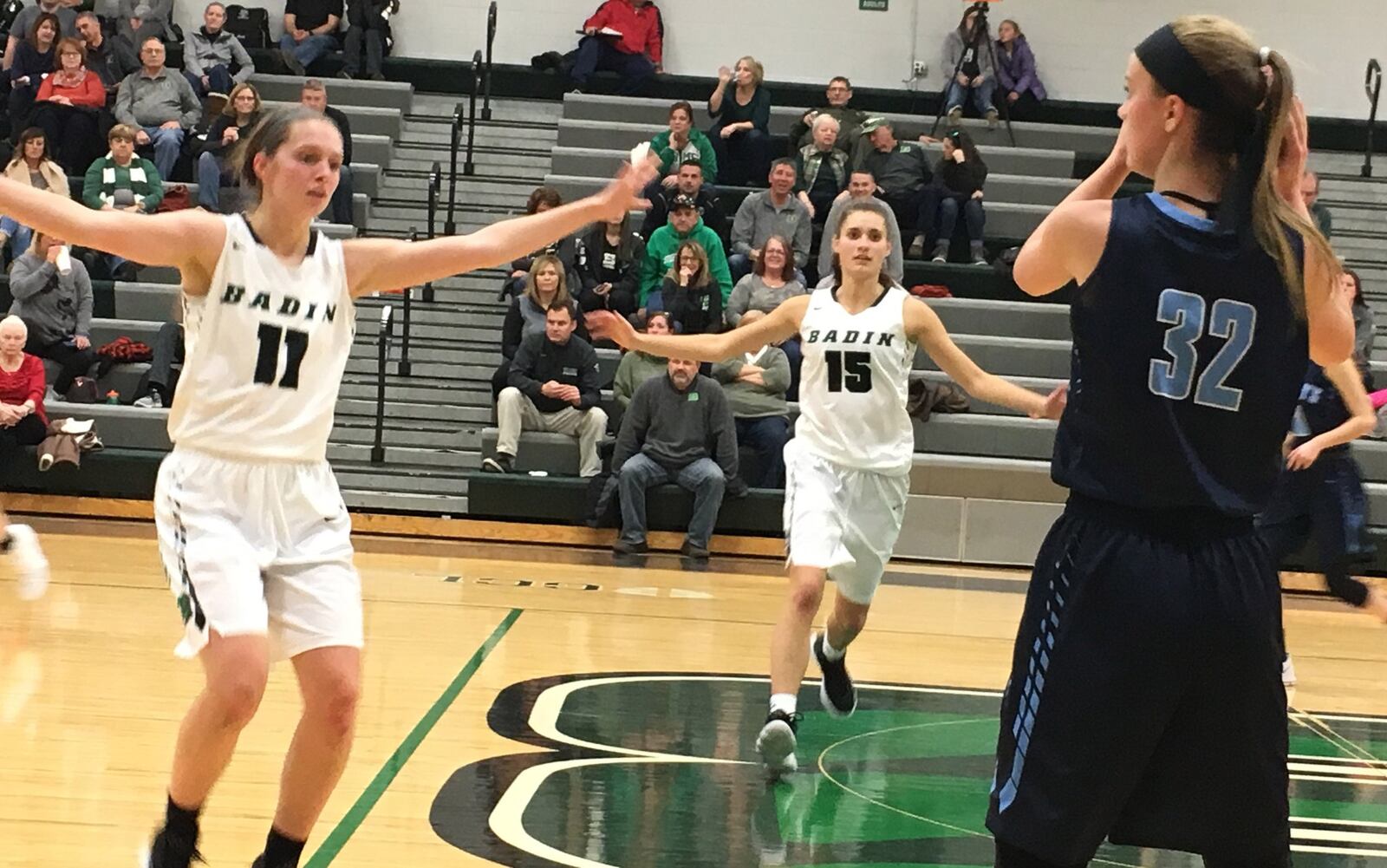 Badin’s Emily Maher (11) and Grace Larkin (15) defend Myla Kline of Lancaster (N.Y.) St. Mary’s during Saturday afternoon’s game at Mulcahey Gym in Hamilton. RICK CASSANO/STAFF