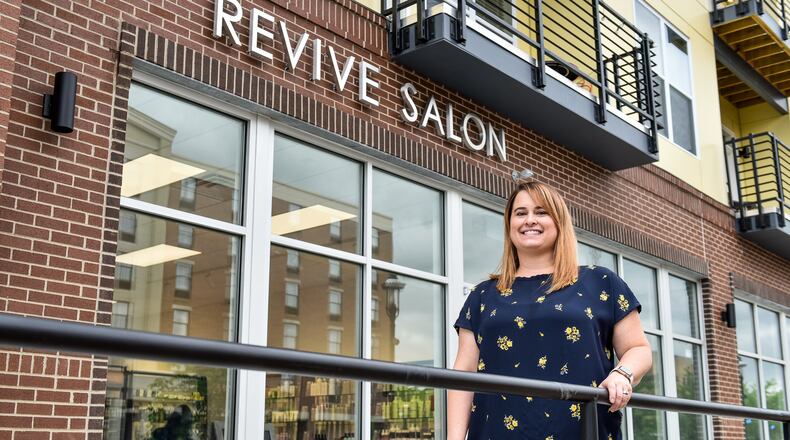 Gina Stitzel has opened Revive Salon in The Marcum complex in downtown Hamilton. Revive Salon is the first retail store in the building with Tano's Bistro, The Casual Pint and several others expected to fill spaces soon. NICK GRAHAM/STAFF