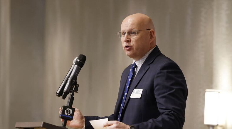 Hamilton City Schools Superintendent Mike Holbrook recently touted the district's highest graduation rate in years. Holbrook credited staffers at the district's high school along with sweeping reforms including some at the middle school grades for the marked improvement.  (Photo by Nick Graham\ Journal-News)