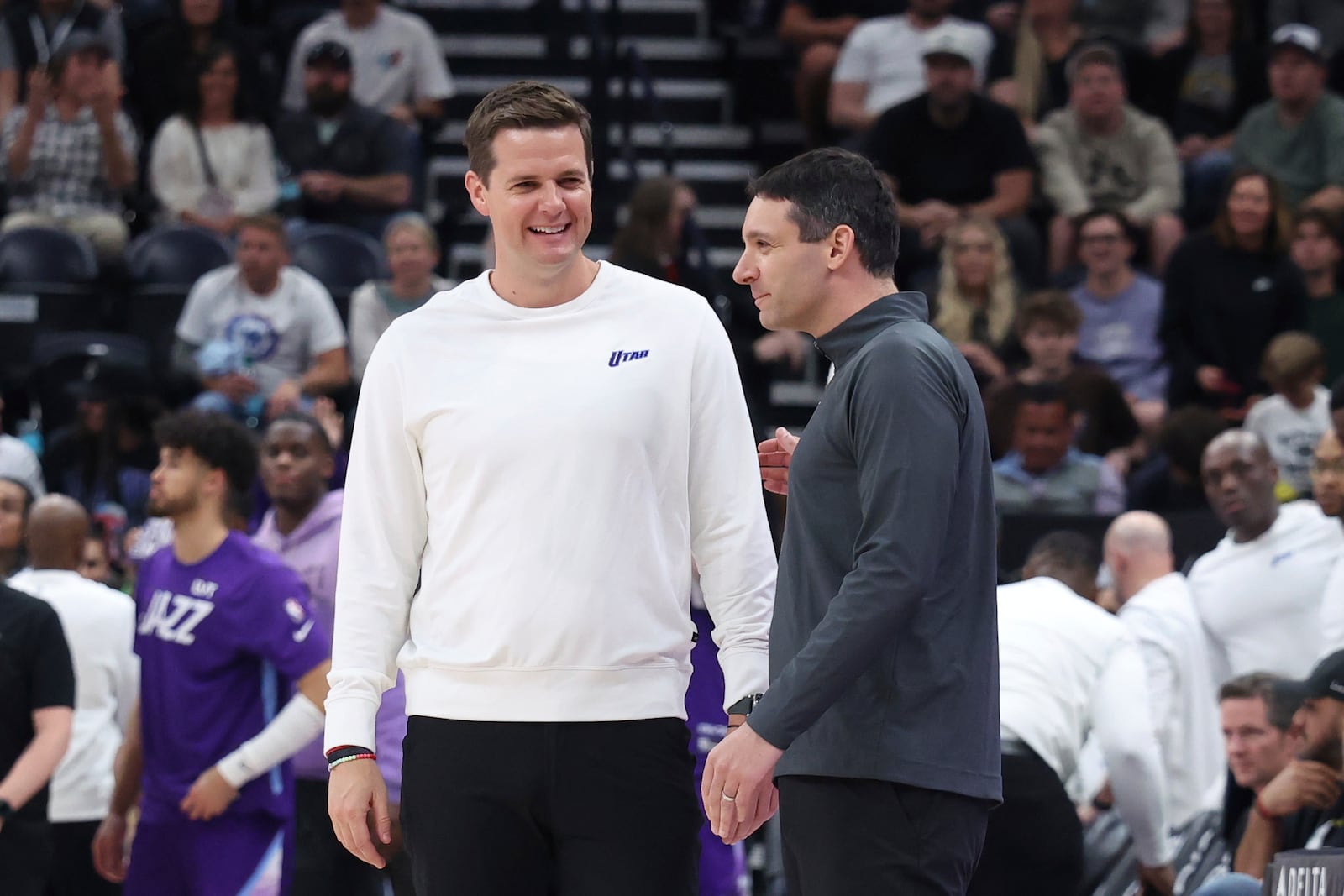 Utah Jazz head coach Will Hardy, left, speaks with Oklahoma City Thunder head coach Mark Daigneault after an NBA basketball game, Friday, April 11, 2025, in Salt Lake City. (AP Photo/Rob Gray)