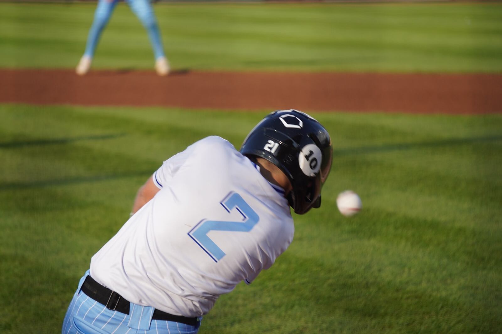 West Side Little League's Jordan Malloy puts the ball in play during his Great Lakes Region championship game against Clarendon Hills (Ill.) on Wednesday at the Little League Central Region Complex in Whitestown, Indiana. West Side lost 9-4. CHRIS VOGT / CONTRIBUTED