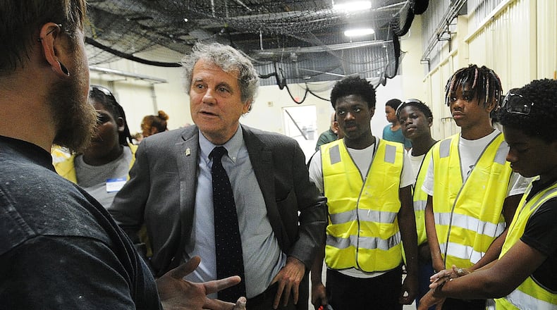 Senator Sherrod Brown talks with instructors and students at the Dayton Buildings Trades Construction Camp Thursday June 29, 2023 held at the IBEW Local 82 Hall. MARSHALL GORBY\STAFF