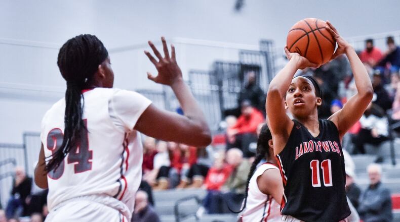 Lakota West’s Dominique Camp (11), shown putting up a shot during a Jan. 16 game at Princeton, had 10 points and six assists Thursday night in the Firebirds’ 71-38 triumph over visiting Fairfield. NICK GRAHAM/STAFF