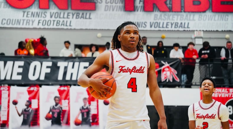 Fairfield's Michael Lewis (4) eyes a free throw attempt against Princeton on Friday night at Fairfield Arena. Chris Vogt/CONTRIBUTED