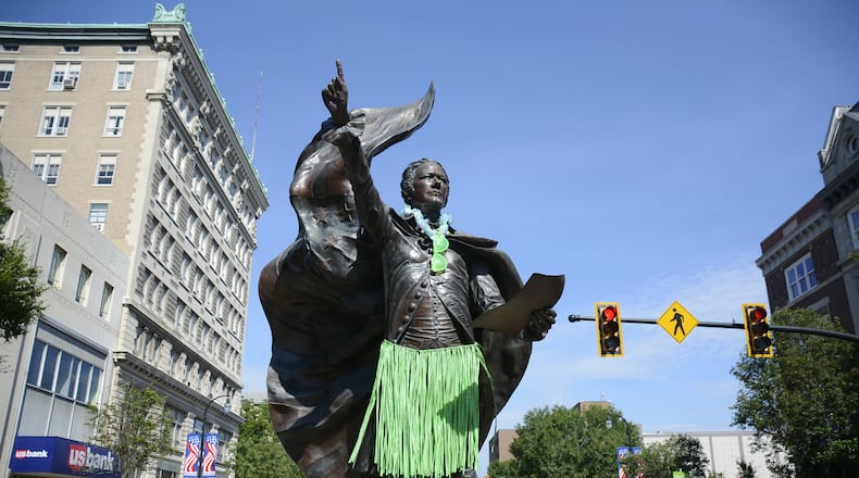 The statue of Alexander Hamilton on High Street was decorated in a green grass skirt, a lei and green shades for the Alive After 5 party on July 5.