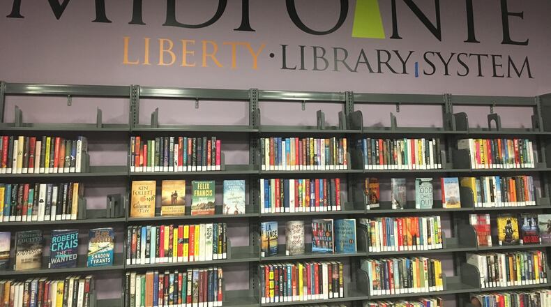 The new MidPointe Library System at Liberty Center will feature a collection of 5,000 items along with a drive-up book return and on-site programming for all ages. ERIC SCHWARTZBERG/STAFF
