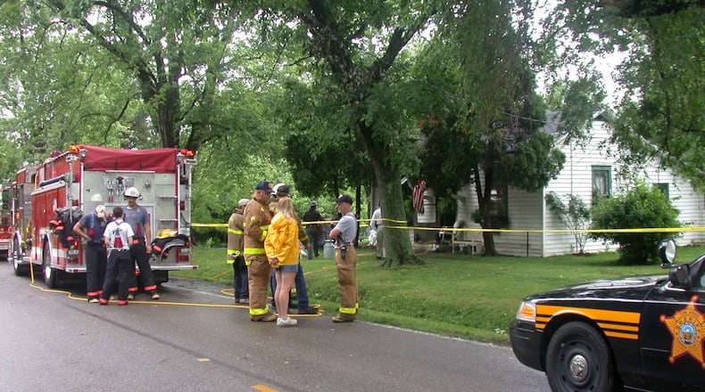 Warren County is applying for an $800,000 federal grant to study first-responder relationships and how they impact responses when children are involved in overdose calls. Pictured is the emergency response to a fatal fire in Harlan Twp. in 2006 in which the victim died of natural causes.Staff photo by Richard Wilson