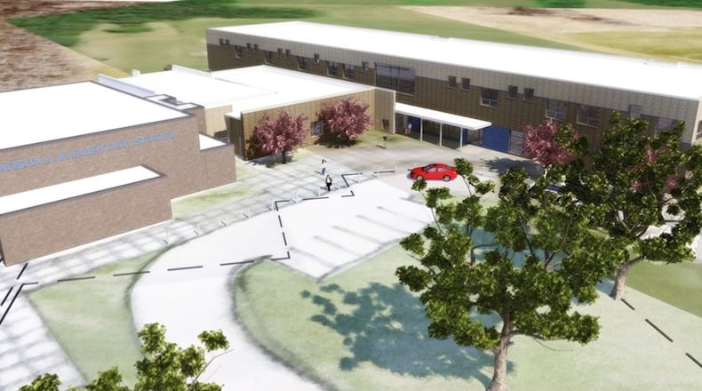 This preliminary sketch by SHP Leading Design shows a possible aerial view of what the new Marshall School might look like. The broken line shows part of the footprint of the current building which will be removed once the new part is completed. CONTRIBUTED