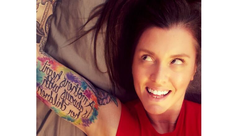Hamilton native Ashley Rouse is competing for top honors in Inked Magazine s Cover Girl contest and its prize of $25,000. The 37-year-old wife and mother of four has five randomly placed tattoos, plus a full sleeve of a theme of everything that makes up who I am. CONTRIBUTED