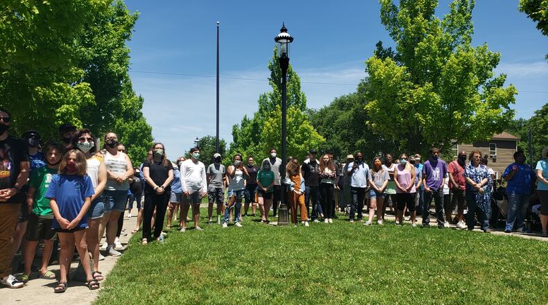A prayer vigil at Bailey Square in Hamilton is under way. Nick Graham/STAFF