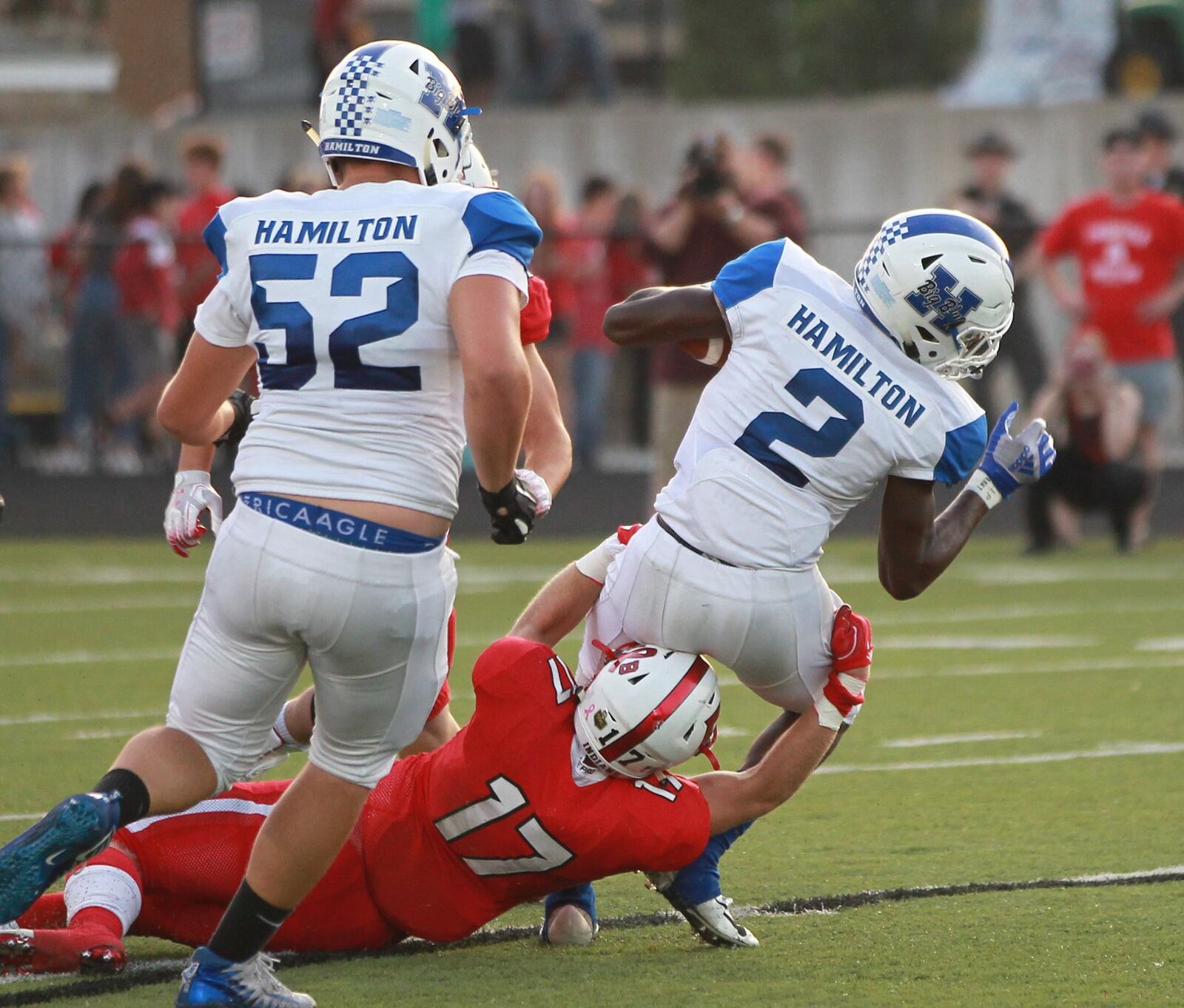 Kaleb Johnson of Hamilton (9) is stopped by Phoenix Porter. Fairfield defeated visiting Hamilton 34-27 in a Week 4 high school football game on Friday, Sept. 20, 2019. MARC PENDLETON / STAFF