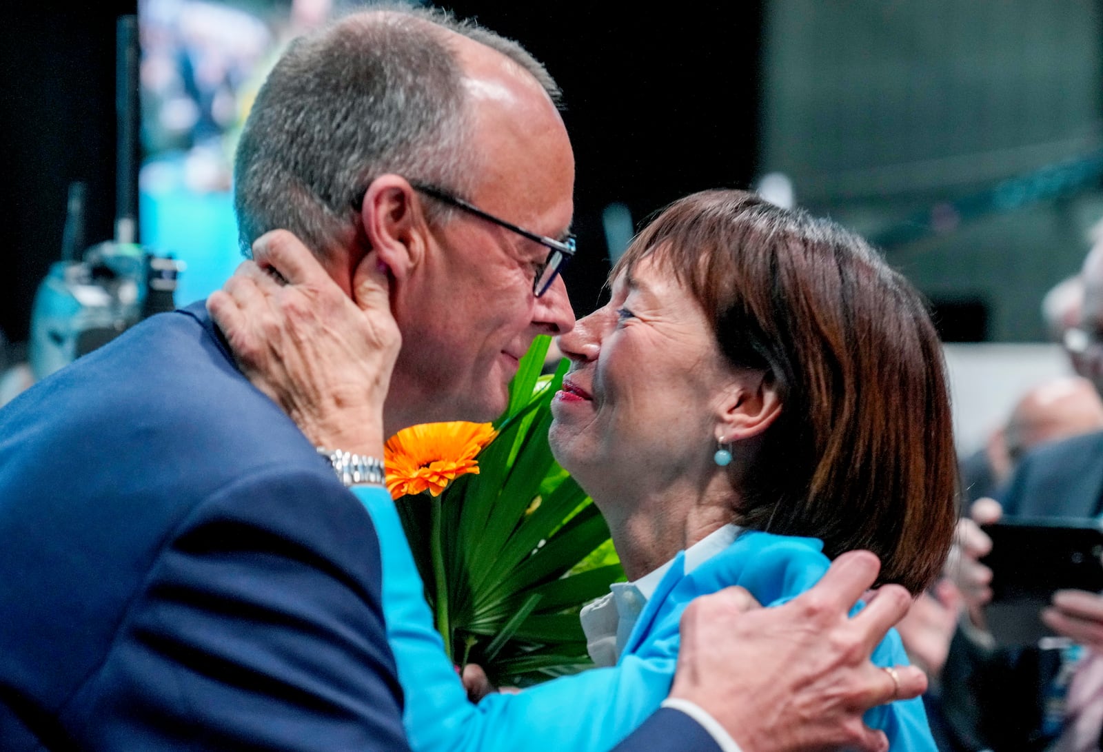 FILE - Christian Democratic Party leader Friedrich Merz is congratulated by his wife after his re-election at a CDU party convention in Berlin, Germany, May 6, 2024. (AP Photo/Ebrahim Noroozi, File)