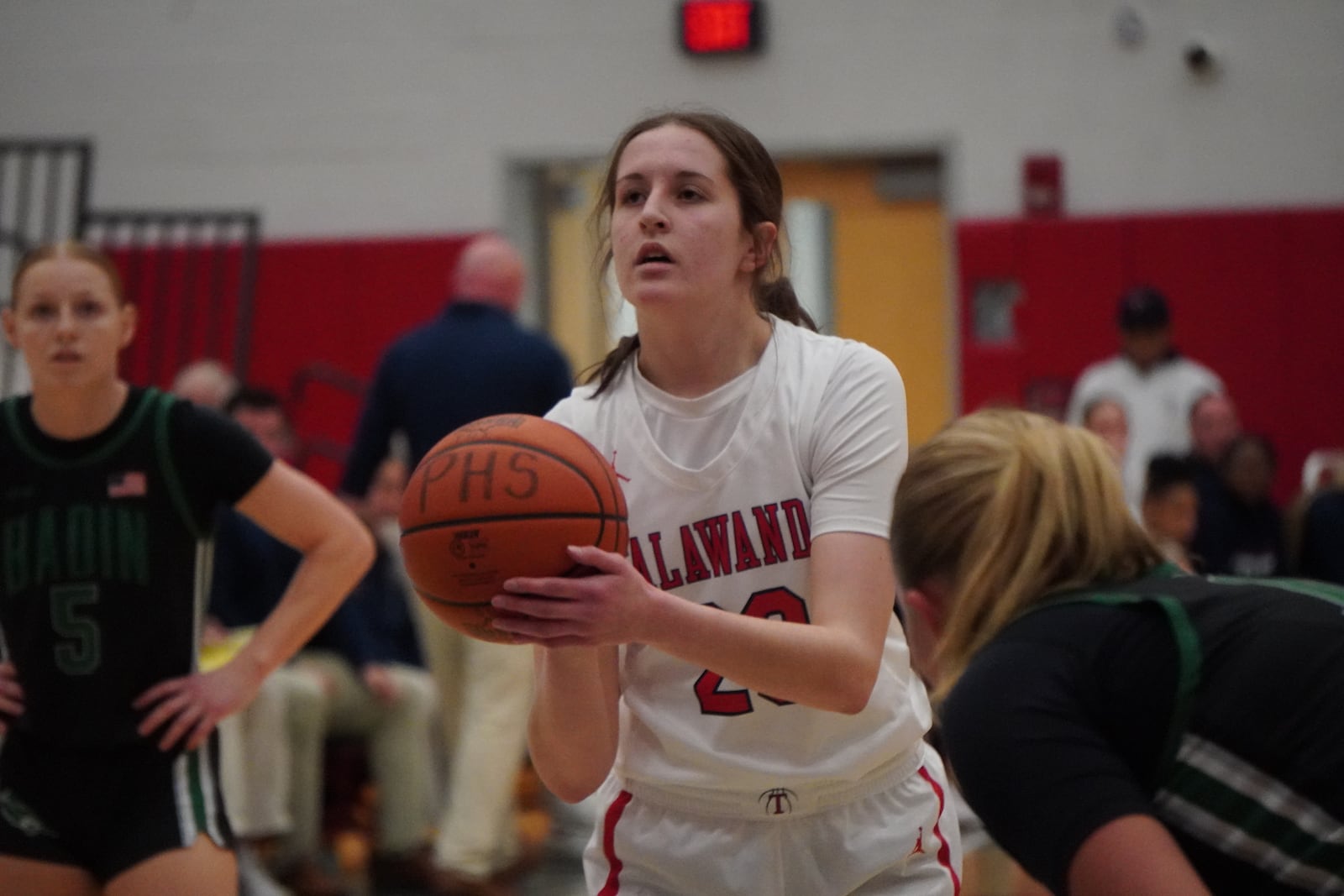 Talawanda's Janna Cary prepares to fire up a free throw against Badin during a Division III district semifinal game on Wednesday night at Princeton. CHRIS VOGT / CONTRIBUTED