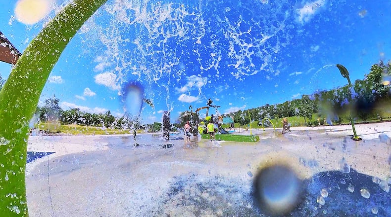 The new splash pad at Beckett Park in West Chester Township is closed until further notice due to operational, maintenance, and safety concerns. NICK GRAHAM/STAFF