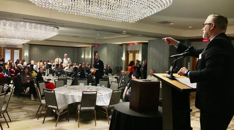 Jon Graft, superintendent of Butler Tech career school system, touted the first-year partnership with Hamilton Schools and other news during the last, pre-COVID-19 State of the Schools luncheon in February 2020. Thursday the yearly event, which includes leaders from Hamilton Schools, Miami University Regionals and Badin High School updating the public, will resume after being canceled by the pandemic in 2021.  (Photo By Michael D. Clark/Journal-News)