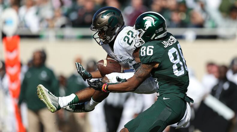 Fairfield High School graduate Josiah Scott (22) comes up with an interception during Michigan State’s spring football game April 1 in East Lansing, Mich. PHOTO COURTESY OF MICHIGAN STATE ATHLETICS