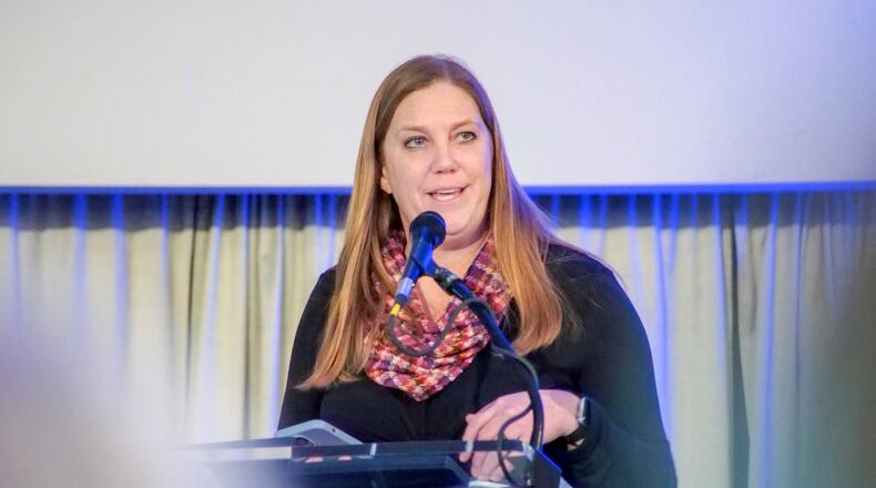 Jen Hayes, K-12 programs curriculum coordinator for the Middletown City School District, talks about the Passport to Tomorrow program Thursday night during the Chamber of Commerce serving Middletown, Monroe and Trenton annual meeting at the Windamere Event Center, CONTRIBUTED PHOTO