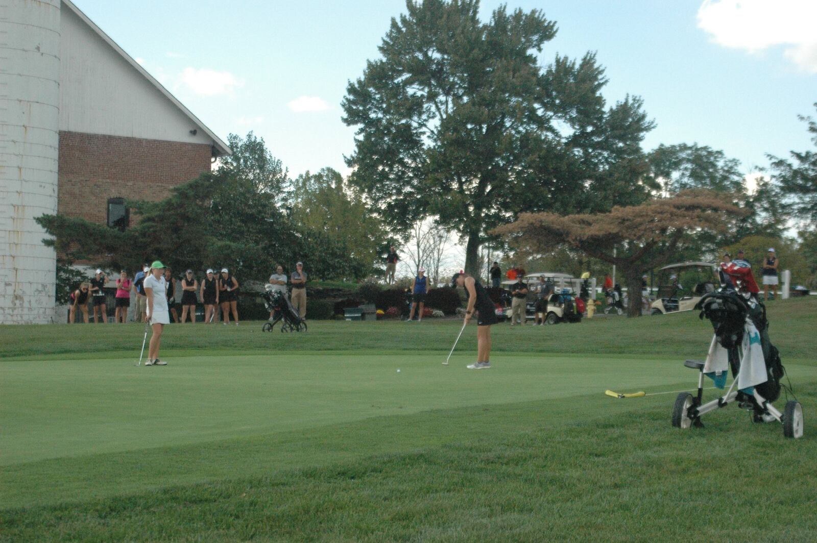 Lakota East’s Bree Wilson finishes her day on the last green Tuesday during the Division I district girls golf tournament at Glenview Golf Course. RICK CASSANO/STAFF