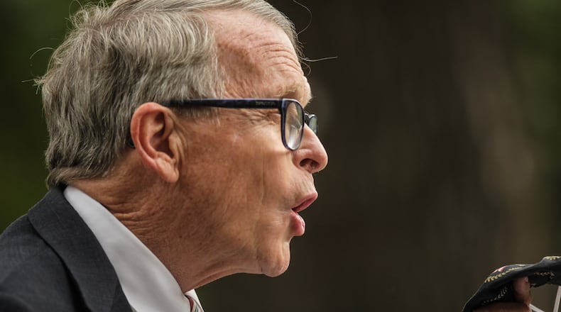 Ohio Gov. Mike DeWine talks to the press Friday October 9, 2020 at the Patterson Homestead on Brown St. in Dayton. DeWine traveled around Ohio on Friday because he was worried about the recent COVID-19 up tick. JIM NOELKER/STAFF