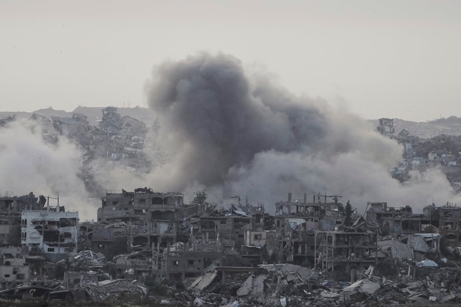 Smoke rises following an Israeli army airstrike in northern Gaza Strip, seen from southern Israel, Friday, May 16, 2025. (AP Photo/Maya Alleruzzo)