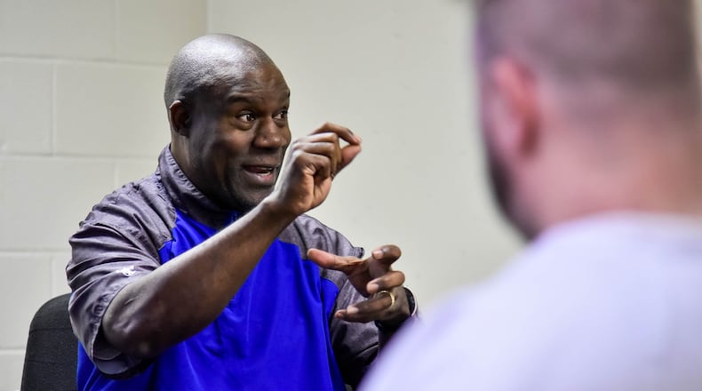 David Fulcher, former Cincinnati Bengal, has expanded his prison ministry to Butler County Court Street Jail where he counsels inmates in his M.A.N.A. (Mentoring Against Negative Actions) program. Fulcher’s wife, Judy, counsels women in the jail. NICK GRAHAM / STAFF