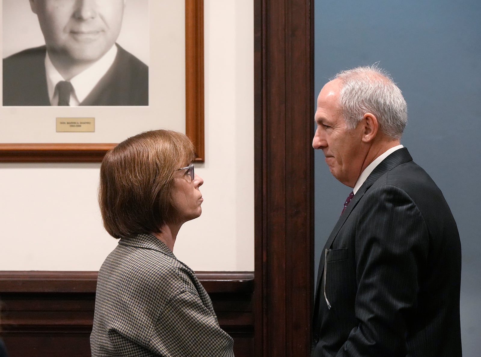 Defense attorney Carole Rendon talks with ex-FirstEnergy Senior Vice President Michael Dowling before the resumption of his trial in Summit County Court of Common Pleas Judge Susan Baker Ross's courtroom in Akron, Ohio on Wednesday, Feb. 18, 2026. (Mike Cardew/Akron Beacon Journal via AP, Pool)