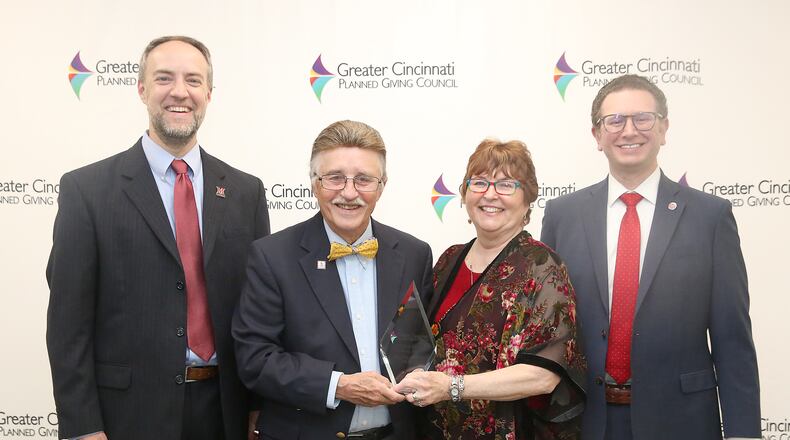 Miami University alums Rosemary and Lee Fisher (center) both sang choral and glee club music while attending their beloved college and in later years they have formed a duet of generosity recently honored by a regional charitable foundation. (Provided Photo/Journal-News)