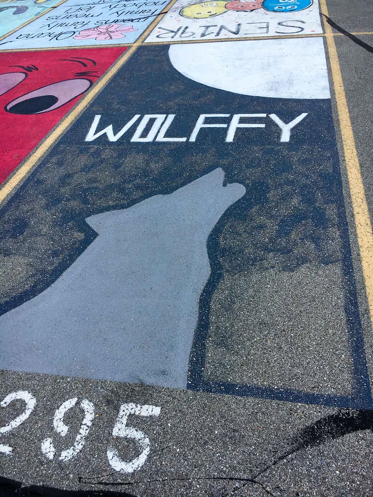 PHOTOS Lakota East seniors paint parking spots