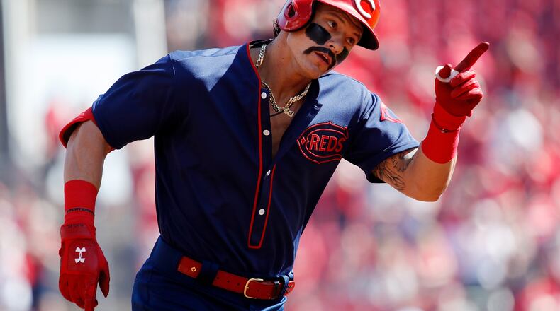 CINCINNATI, OH - MAY 05: Derek Dietrich #22 of the Cincinnati Reds reacts after hitting a solo home run, the team’s third straight, in the first inning against the San Francisco Giants at Great American Ball Park on May 5, 2019 in Cincinnati, Ohio. (Photo by Joe Robbins/Getty Images)