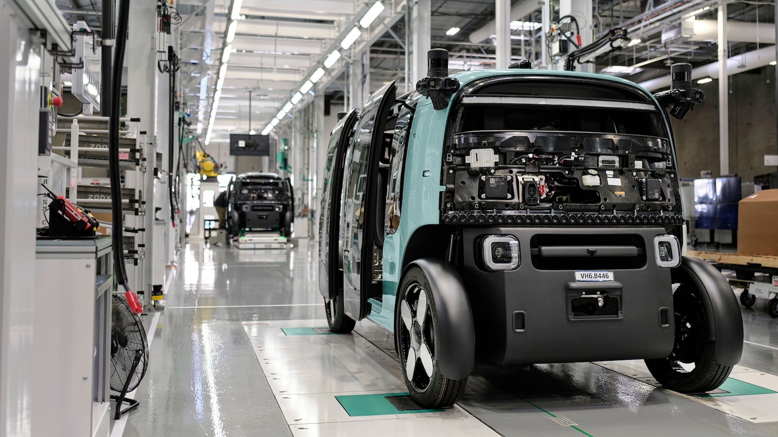 In this undated handout photo provided by Zoox, Zoox robotaxis are assembled at a 220,000-square-foot factory located in Hayward, California. (Zoox via AP)